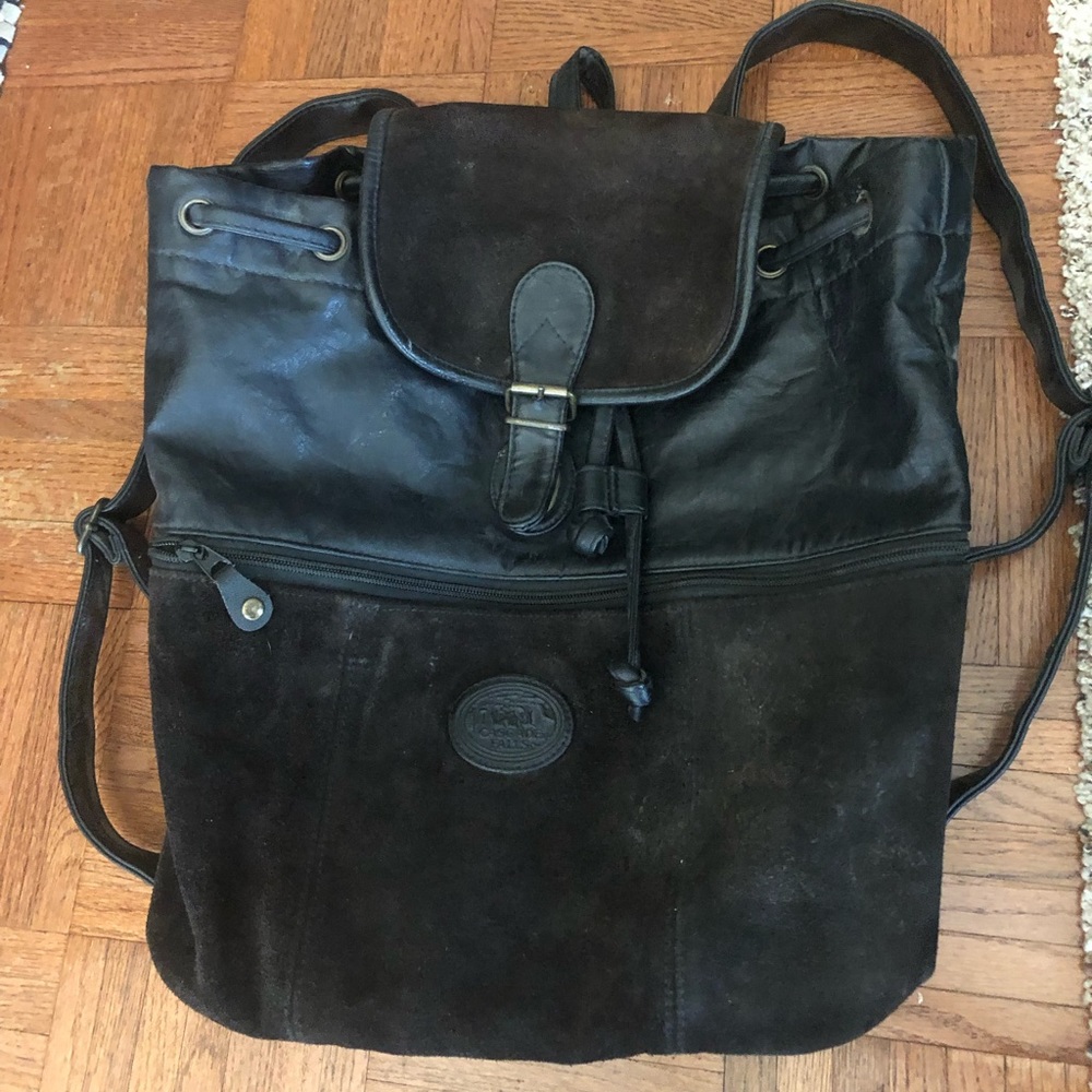 Leather and suede black backpack medium size barely used clasp closure two strap